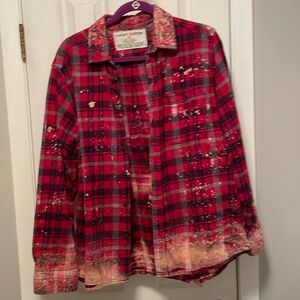 Women’s size 2X flannel button-down shirt, but it runs small.